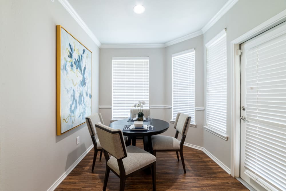 Dining room with several windows at Marquis at Bellaire Ranch in Fort Worth, Texas