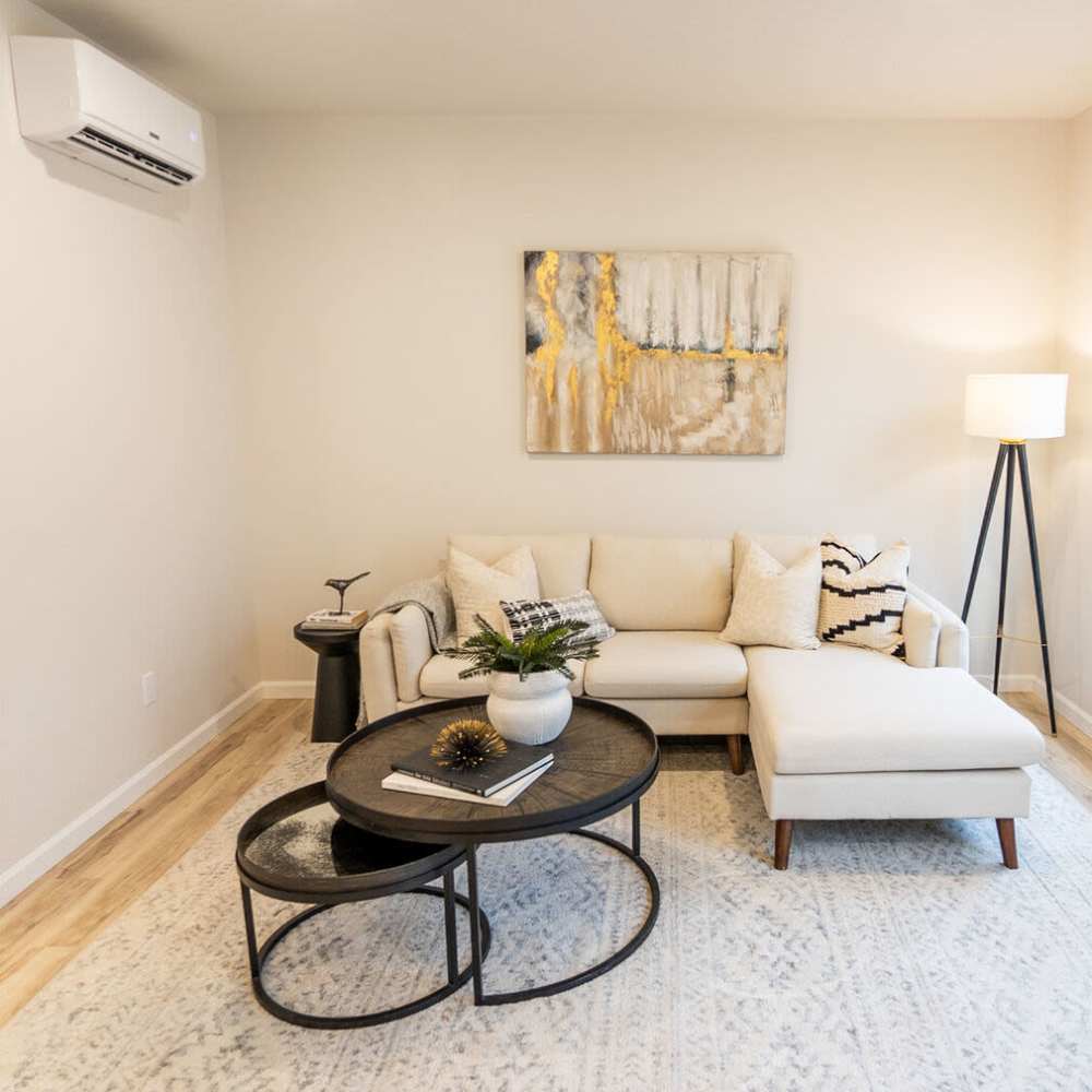 Spacious living room with air-conditioner at 4315 S. Alder in Tacoma, Washington