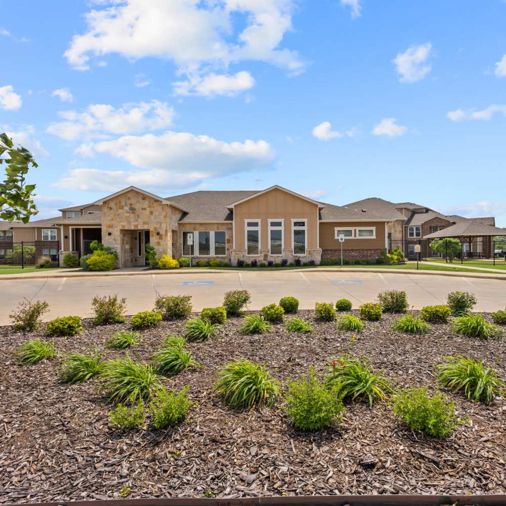 Exterior view of the community with greenery at Deer Park in Athens, Texas