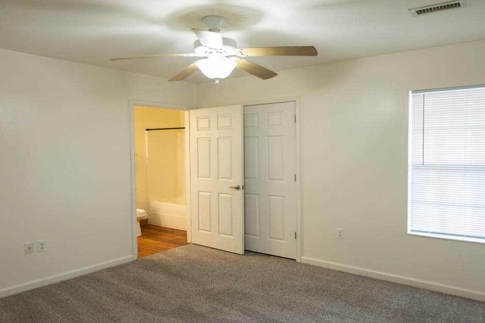 Bedroom with a carpet floor at Fairway Breeze in El Reno. OK