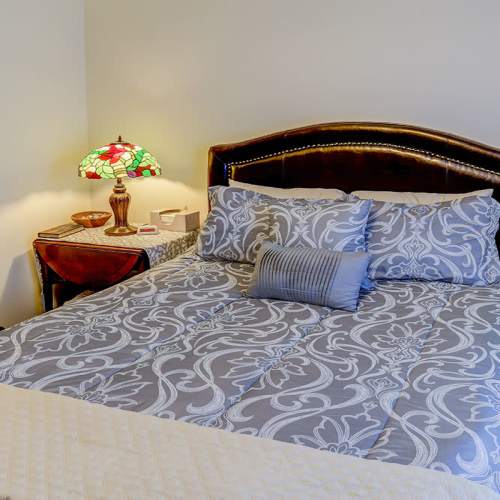 Bedroom with a sidelamp at Zacharys Crossing in Washington Court House, Ohio