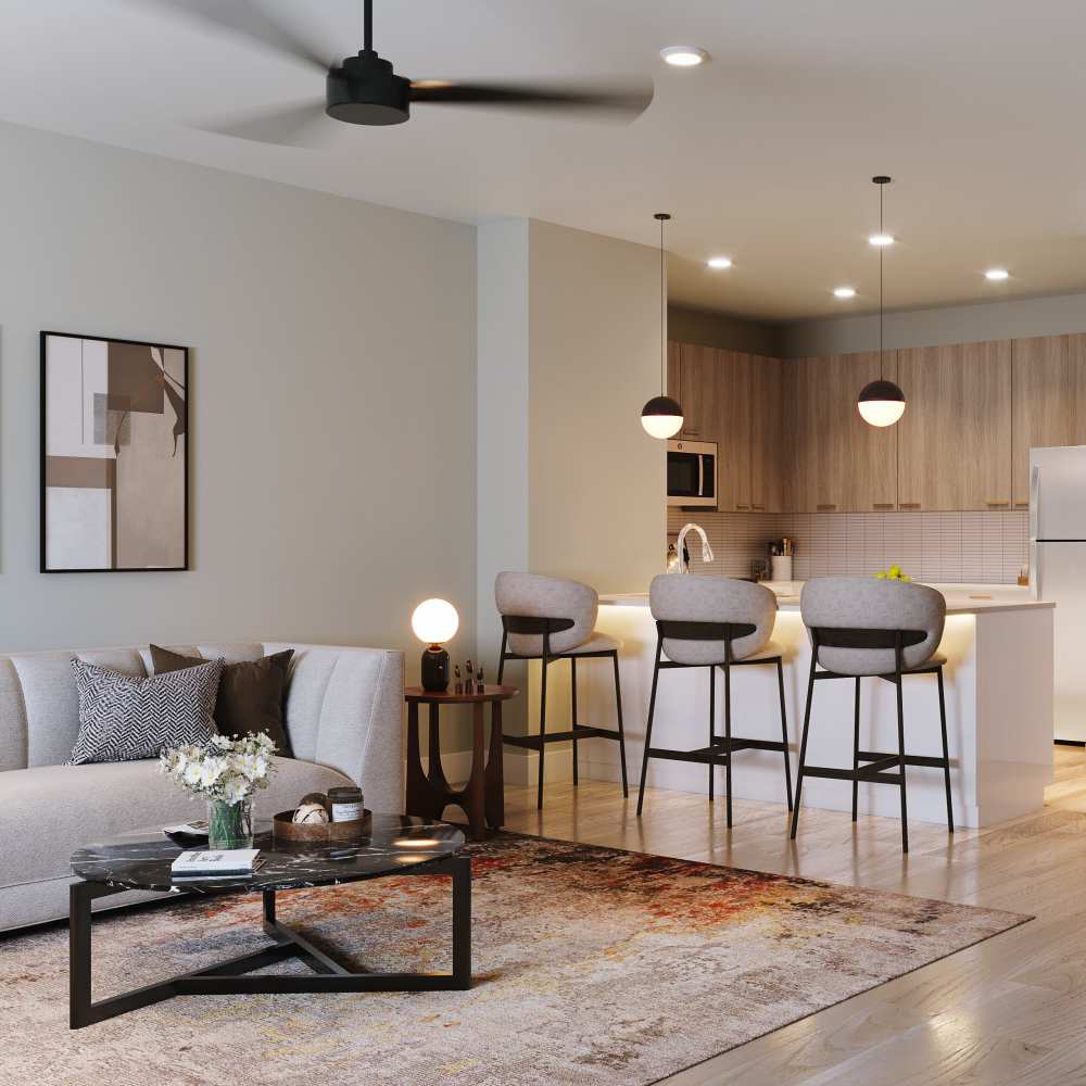 Living room and kitchen bar at Stone Village Apartments in Reno, Nevada