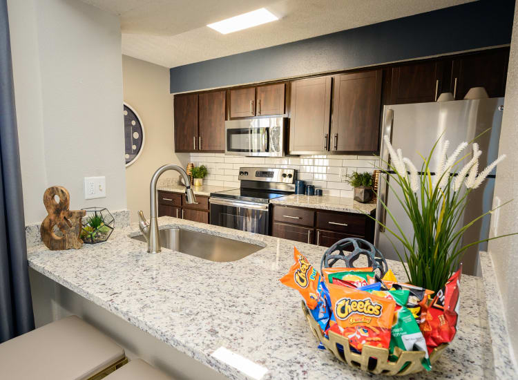 Spacious kitchen with ample counter space and custom cabinetry at Laurel Heights at Cityview in Fort Worth, Texas