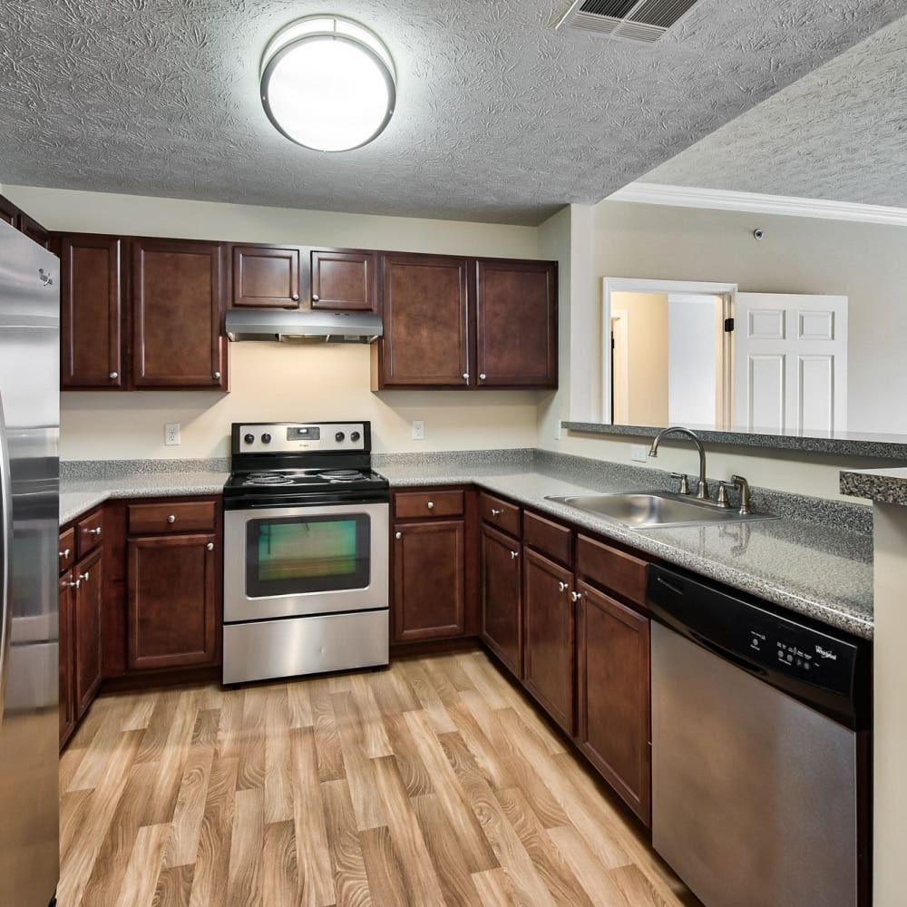 Kitchen with wood-style floor at Chatham Commons, Cranberry Township, Pennsylvania