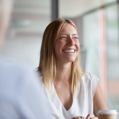 Employee smiling at Liberty Military Housing in Newport Beach, California