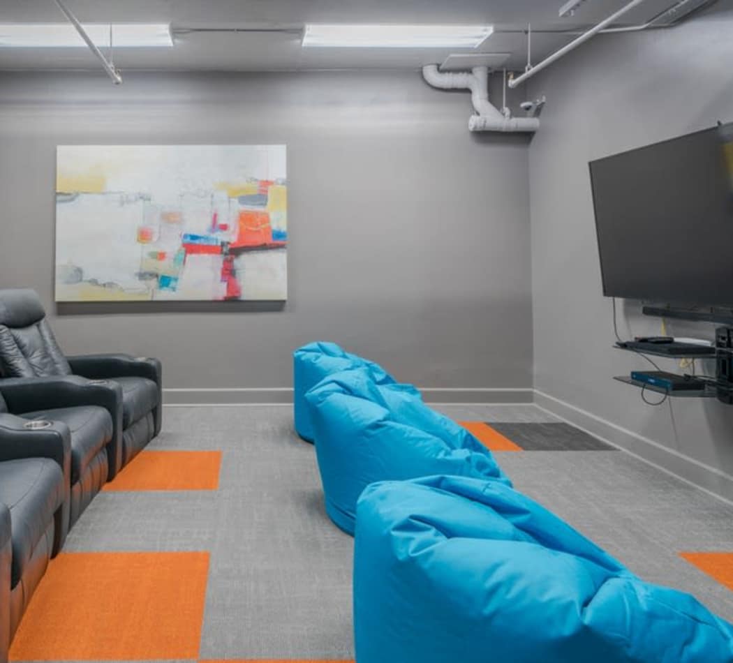 The Enclave at 1550 Apartments offers a cozy theater room in San Antonio, Texas