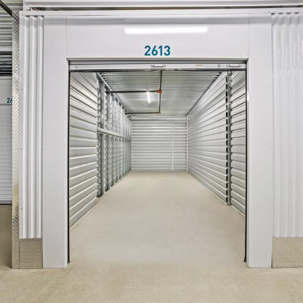 Inside a large climate-controlled unit at StorQuest Self Storage in Encinitas, California