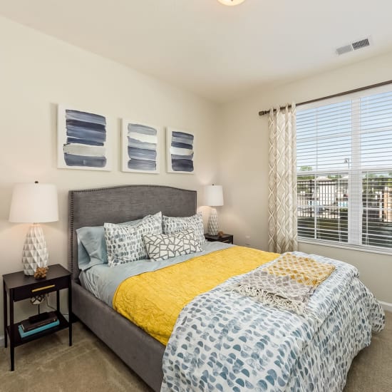 Bed and nightstand in a model home's bedroom at Overland Park in Pickerington, Ohio