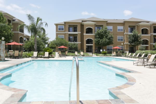 Pool area at The Villas at River Park West in Richmond, TX
