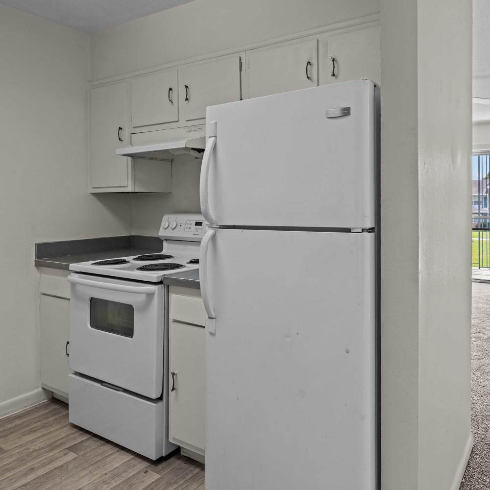 White refrigerator and oven at Falcon House in Fort Walton Beach,Florida