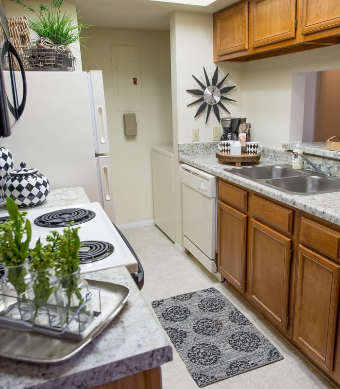 Kitchen with granite countertops at The Courtyards in Tulsa, Oklahoma