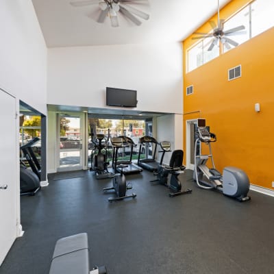 Fitness center with weight and aerobic equipment machines at Bidwell Park Fremont in Fremont, California