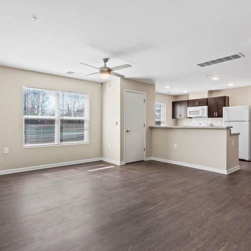 Living room with wood flooring at Stanton Park Apartments in Atlanta, Georgia