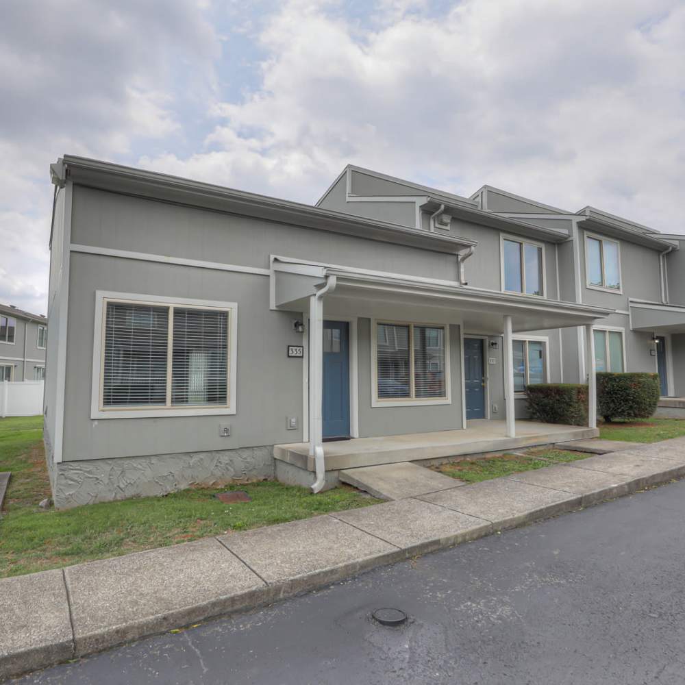Exterior view of apartment at Village Lake Townhomes in Smyrna, Tennessee