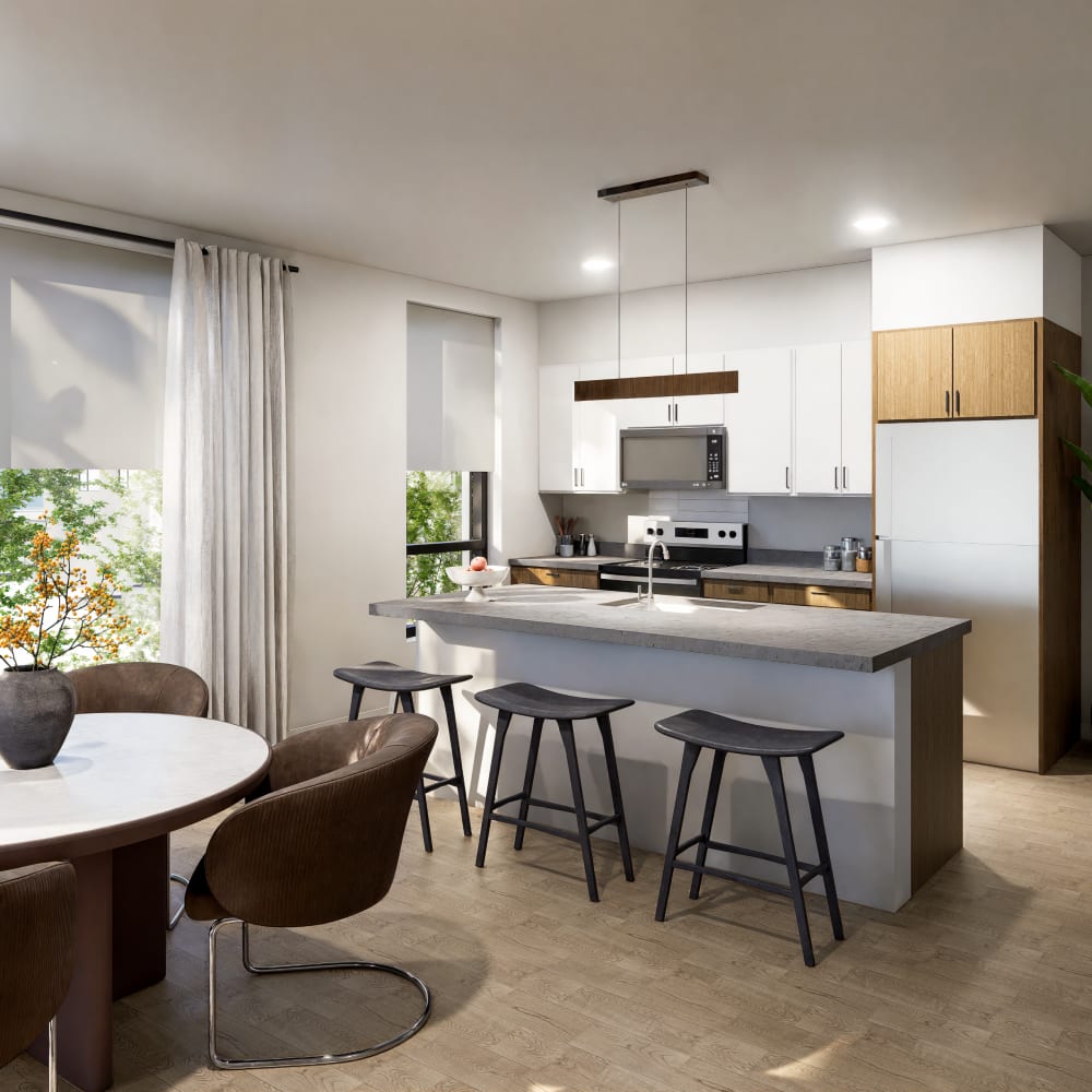 Modern kitchen with sleek countertops and stylish seating area at Bellwood Gateway Apartments in Bellwood, Illinois