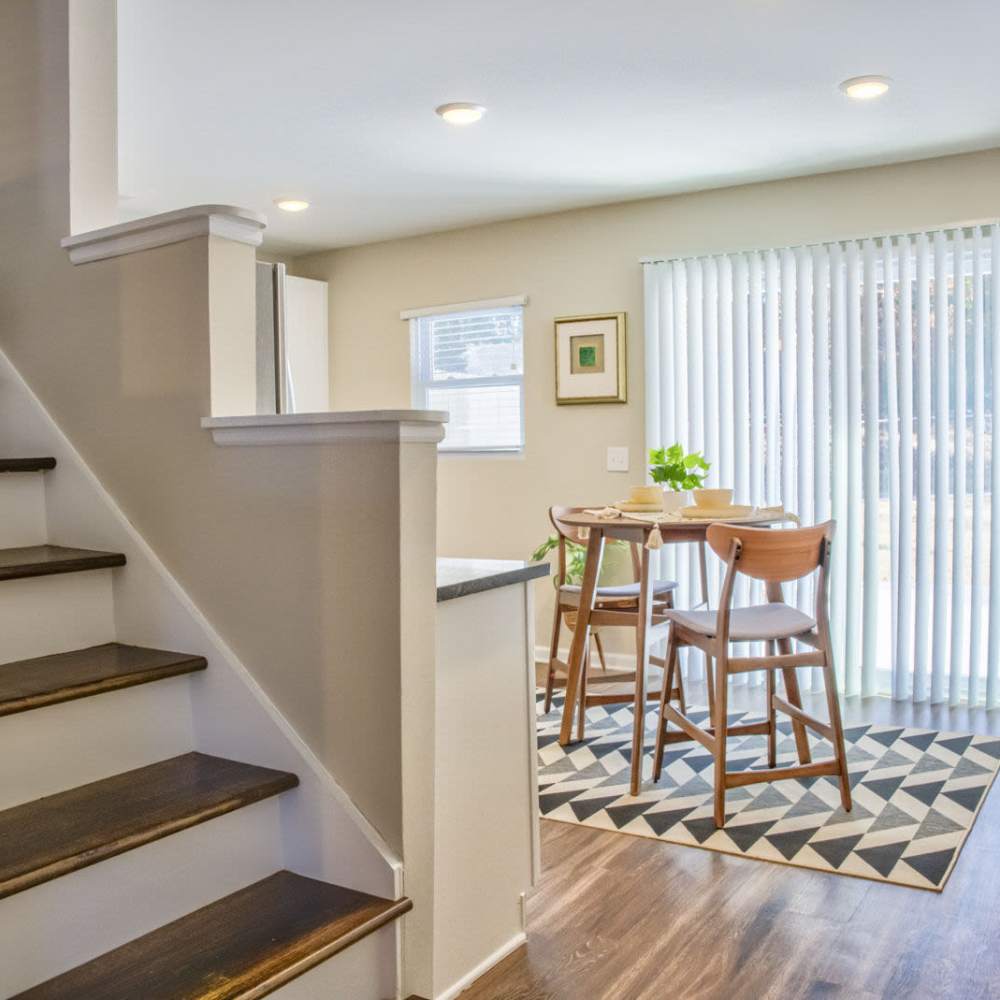 Staircase with view to dining are at Avonlea Westside in Atlanta, Georgia