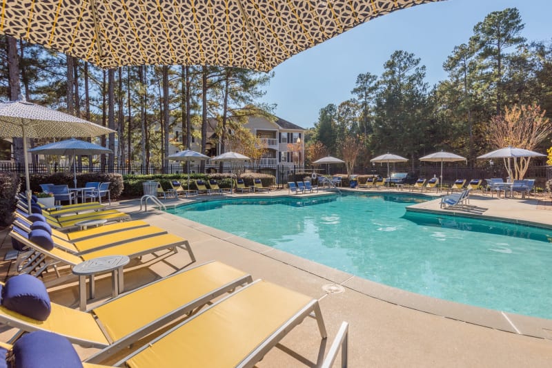 Lounge chairs poolside at The Oxford in Conyers, Georgia