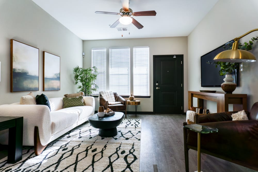 Living room with large window at Wrenfield at Pleasant View in Madison, Wisconsin