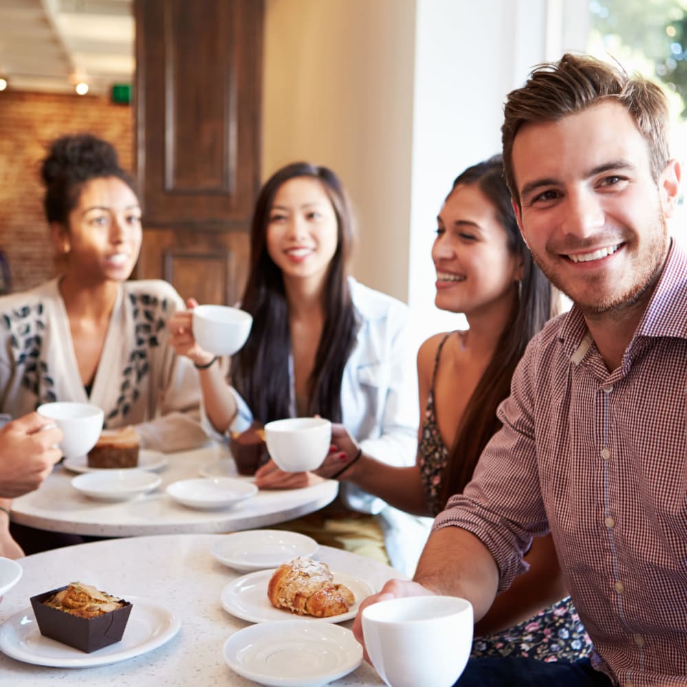 residents enjoy coffee near a Berkshire Community