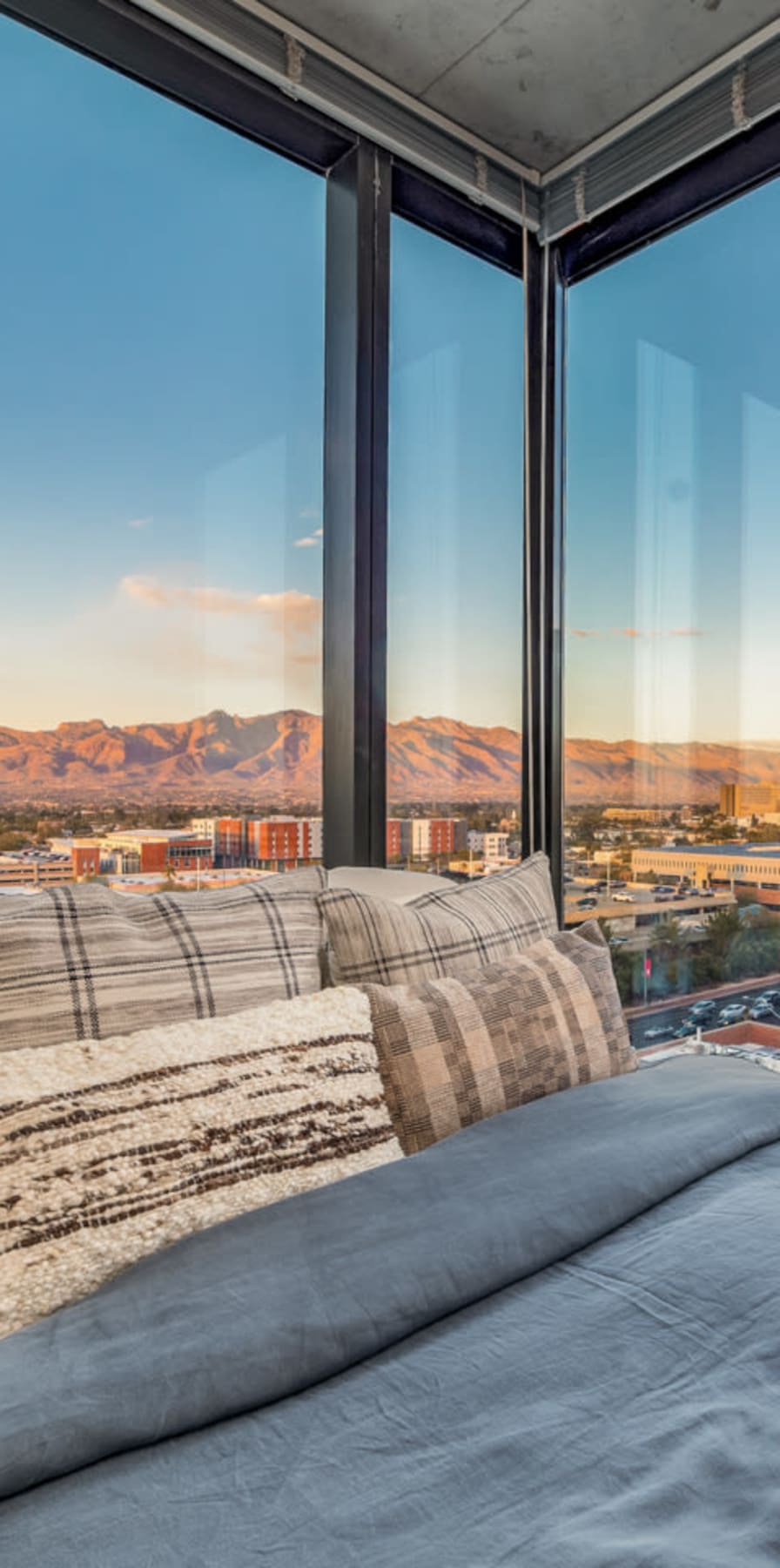 Bedroom with large windows with great views at Sol y Luna in Tucson, Arizona