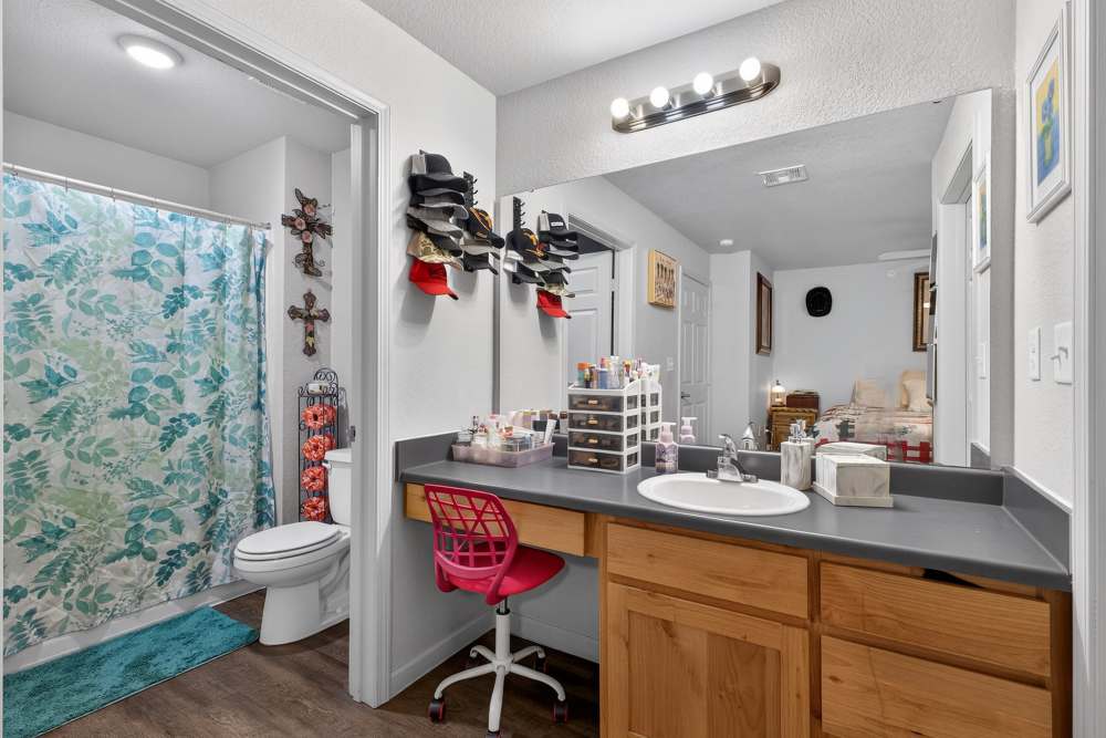 Charming bathroom with a relaxing atmosphere and modern fixtures at Lakewood Crossing in Granbury, Texas.