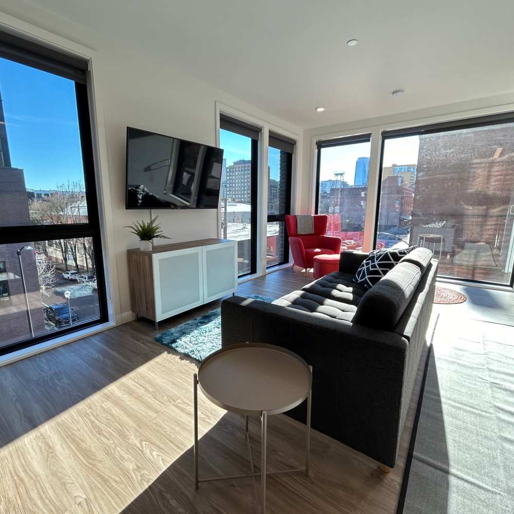 Living room with couches and a TV at DOCK 59 in Portland, Oregon