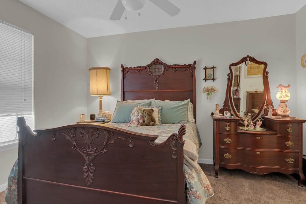 Bedroom with carpet flooring at Hartford Villas in Broken Arrow, Oklahoma