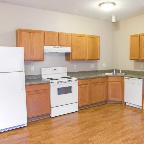 Open kitchen in an apartment at Crown Point Apartments in Ames, Iowa