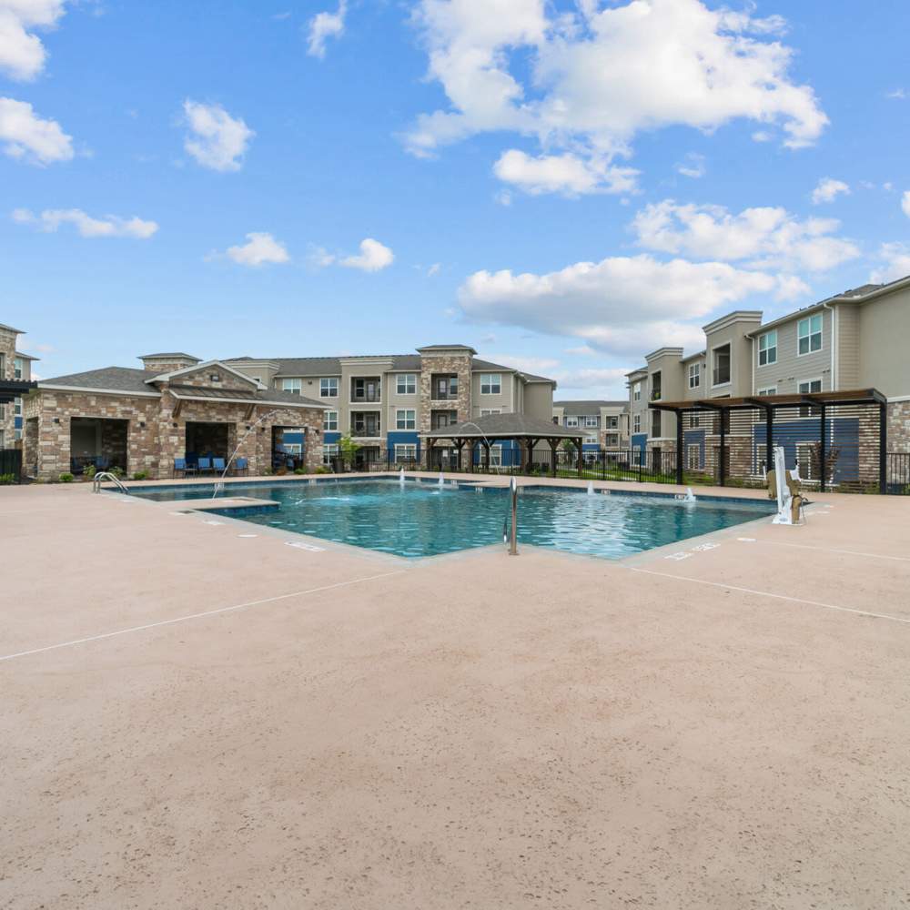 Outdoor pool at Cross Timbers Apartments in Greenville, Texas