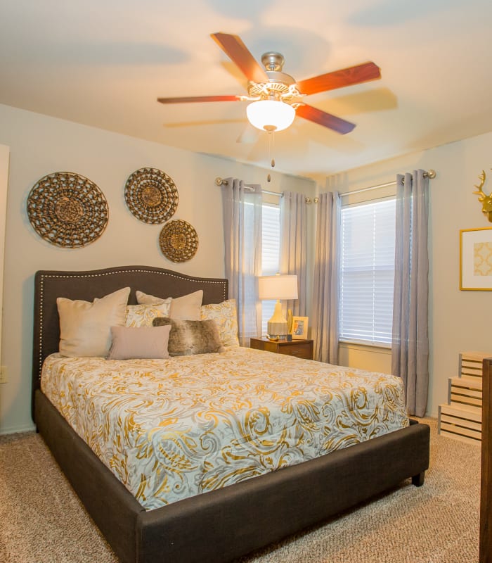Spacious carpeted bedroom at Icon at Broken Arrow in Broken Arrow, Oklahoma