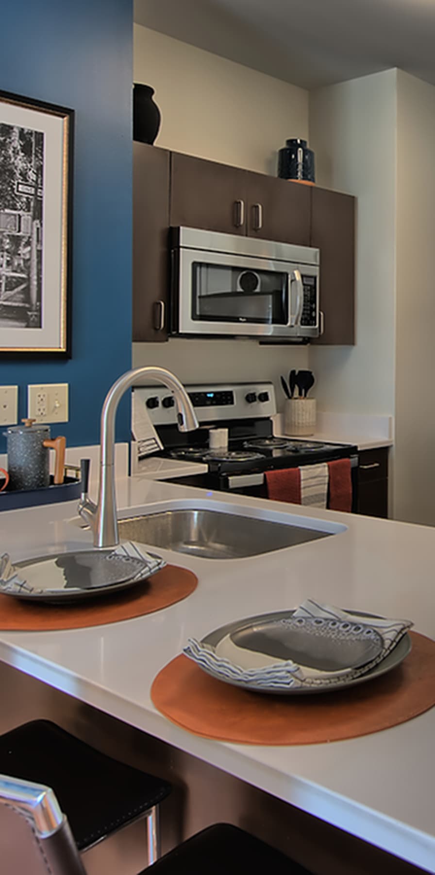 Modern kitchen in a model student apartment at Twin River Commons in Binghamton, New York