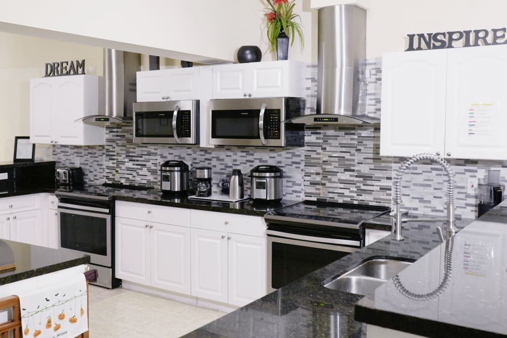 Kitchen in apartment at The Club at Wellington in Wellington, Florida