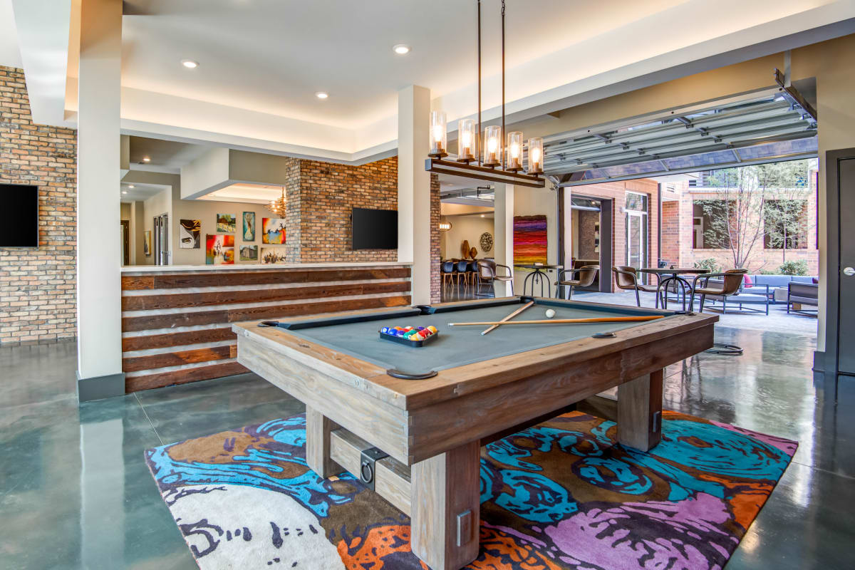 Billiards table in the game room at Mercury NoDa in Charlotte, North Carolina