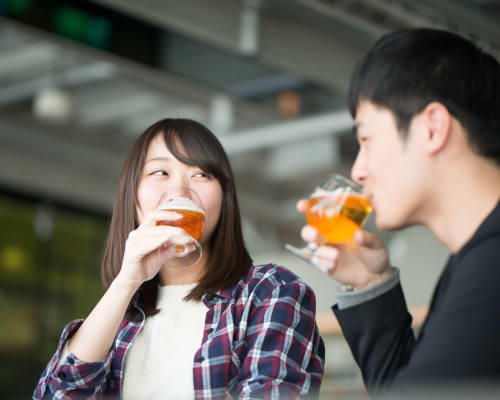 Two residents sharing some drinks near Baxter Street in Charlotte, North Carolina