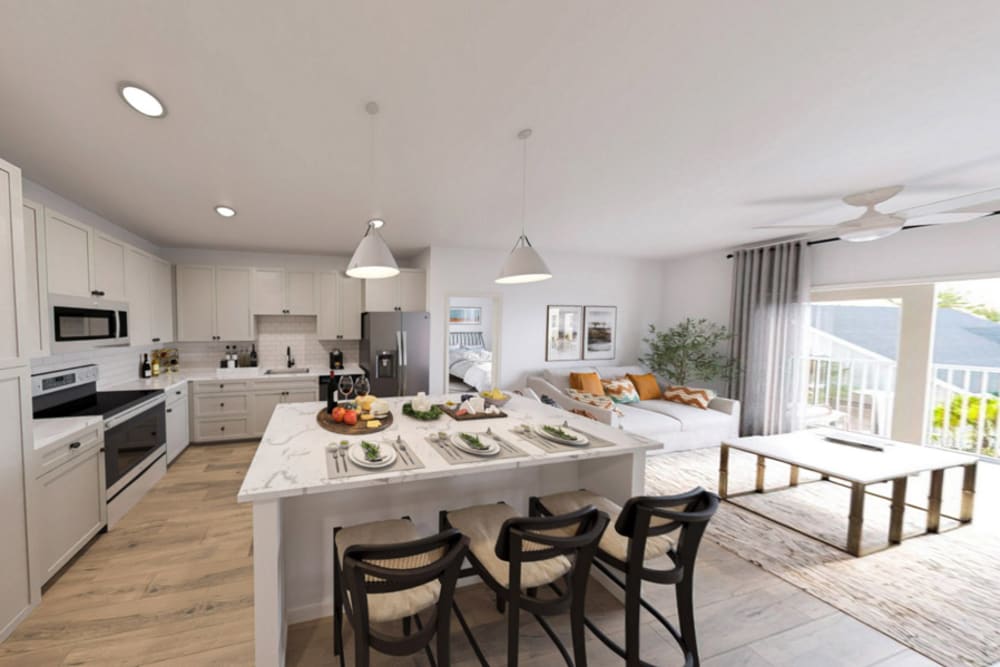 Gourmet kitchen and living room opening onto a private patio in a luxury apartment at Primrose at Santa Rosa Beach in Santa Rosa Beach, Florida