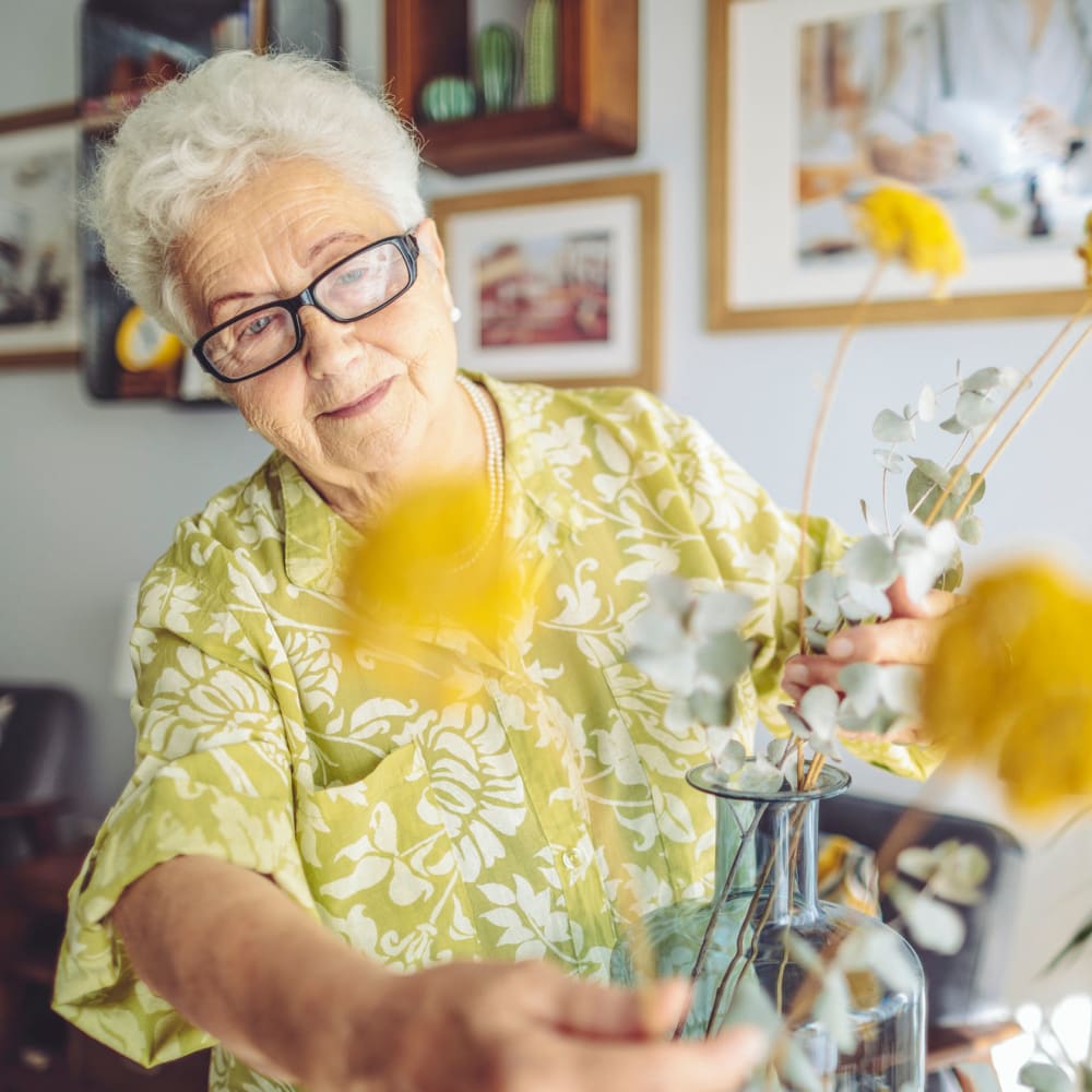 Resident arranging flowers Carolina Gardens at Lexington in Lexington, South Carolina