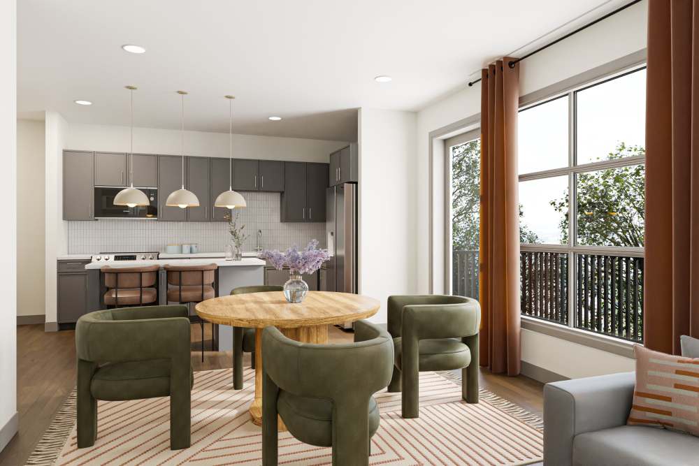 Open kitchen with dining table at St. Albans Lofts in Raleigh, North Carolina,