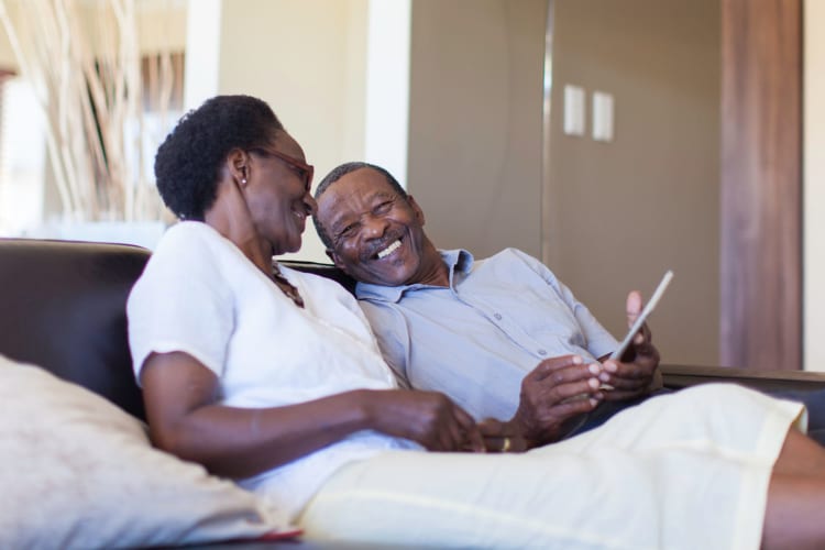 A couple on the couch in Parkside of Livonia in Livonia, Michigan