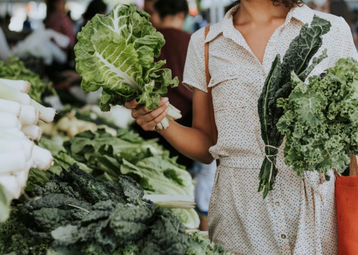 Resident shopping at a farmer's market near The Villas at Anacapa Canyon in Camarillo, California