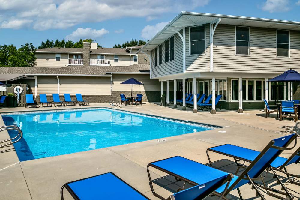 Pool with sundecks at The Falgrove Apartments in Omaha, Nebraska