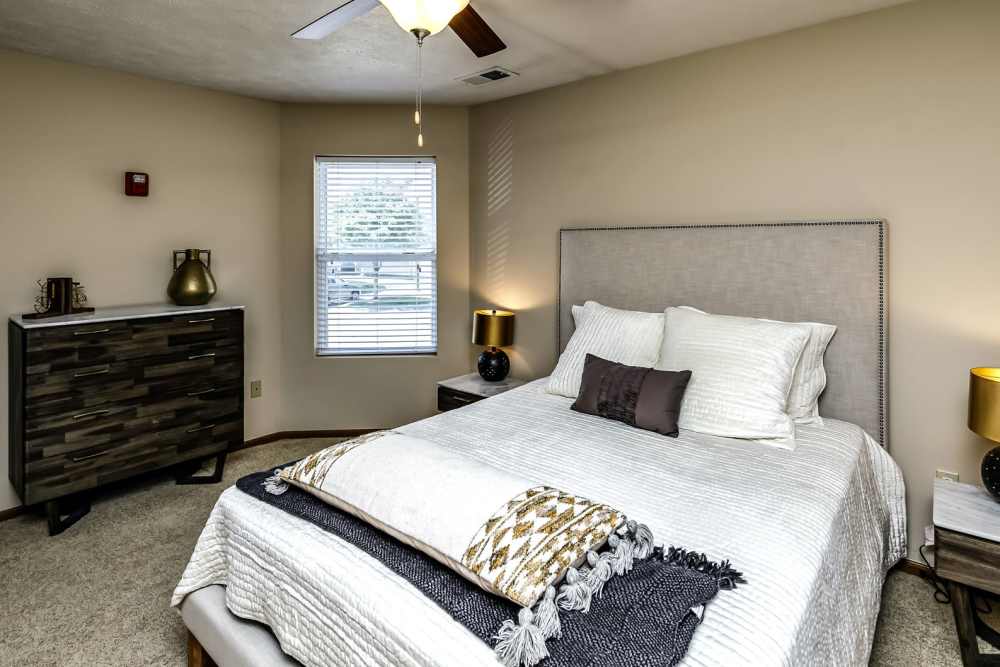 Bedroom with ceiling fan at The Falgrove Apartments in Omaha, Nebraska