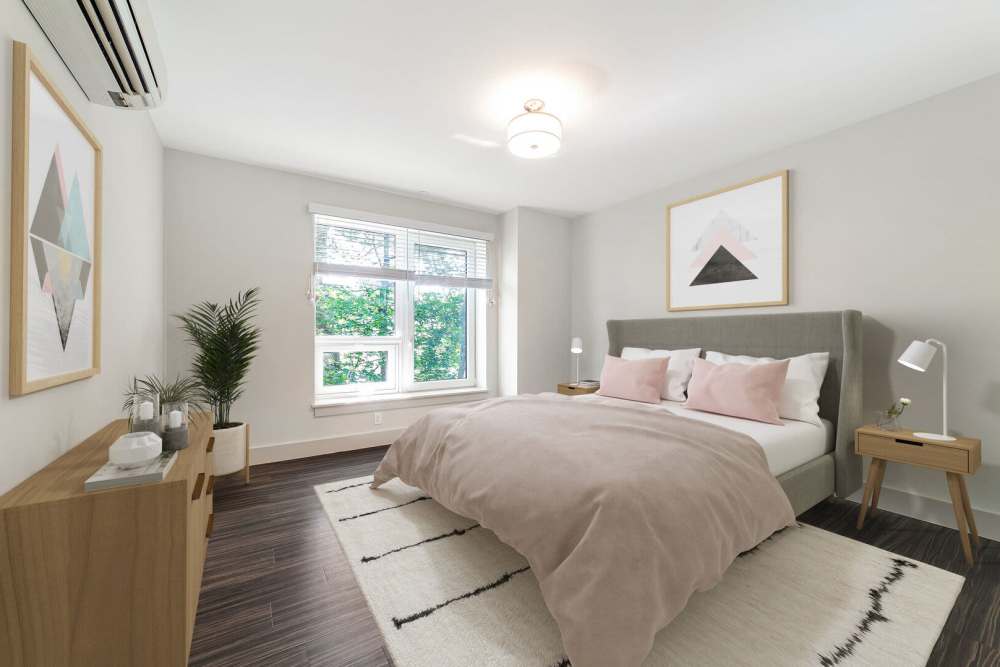 Bedroom with windows at Tavernier Place in Acton. MA