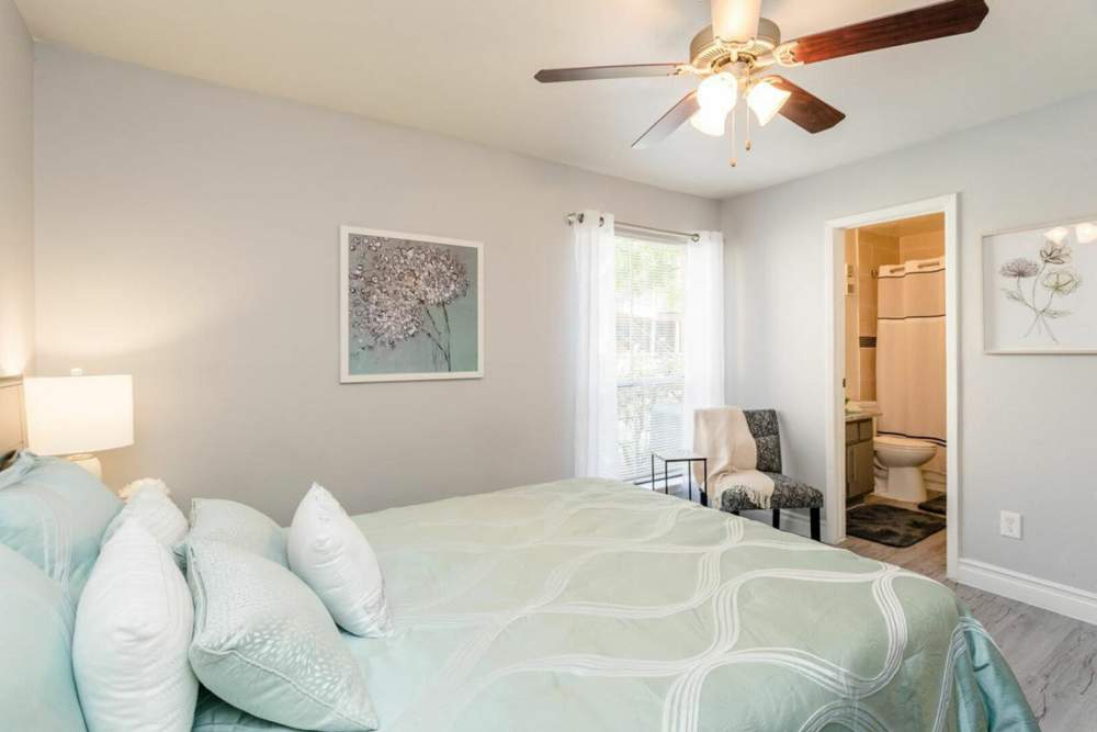 Cozy bedroom with closets at Ridge Point in Houston, Texas