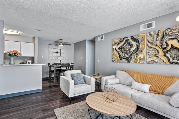 Spacious living room and dining room view at City Center Station Apartments in Aurora,