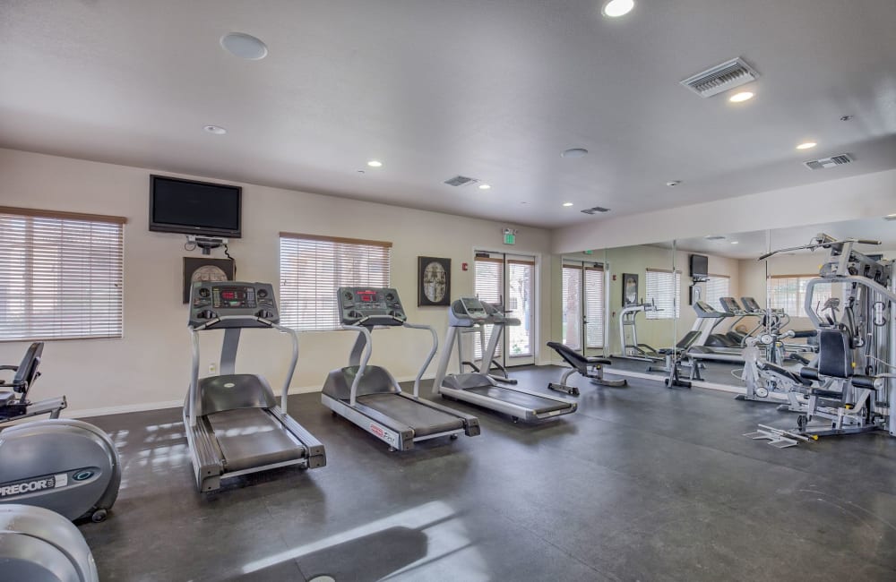 Fitness center with treadmills at  Miraflores Apartments in El Centro, California