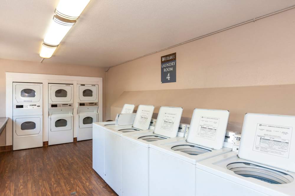 Laundry facility at The Woodlands Apartments in Sacramento, California