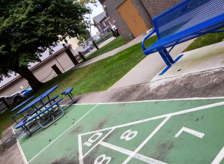 Seating area beside the basketball court at Bedford Towers in New Bedford, Massachusetts