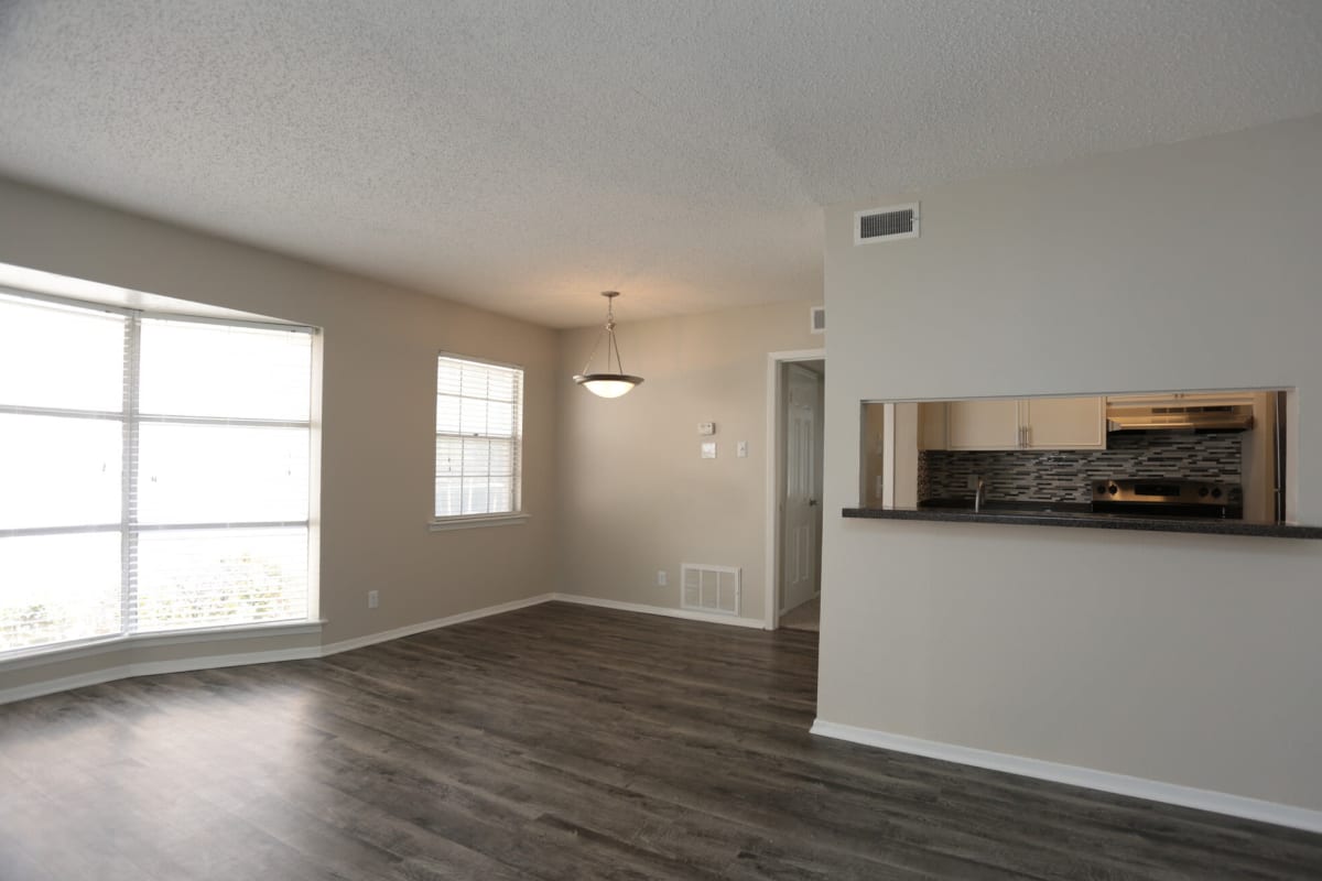Apartment kitchen and living room at Tanglewood in San Antonio, Texas