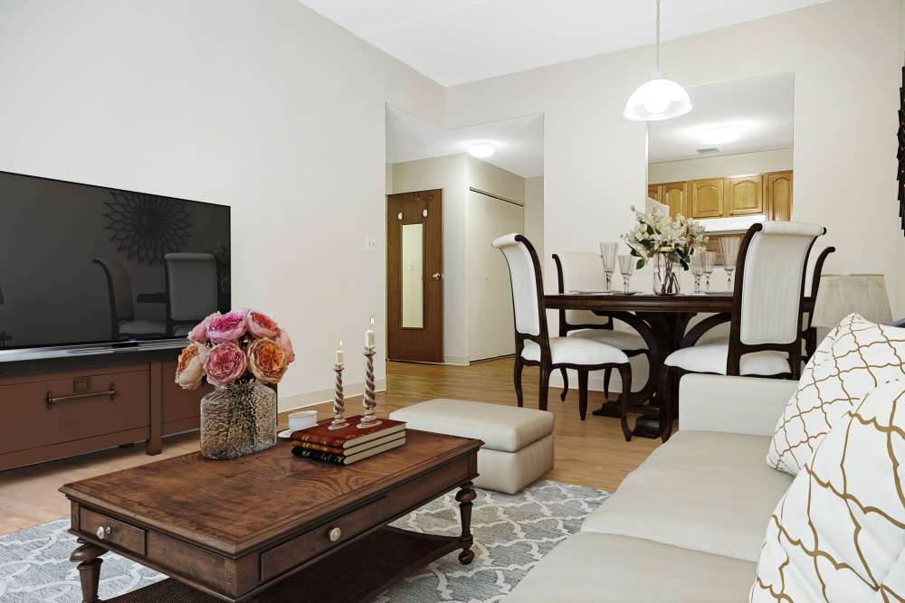 Living room with dining area at Victory Gardens in East Boston, Massachusetts