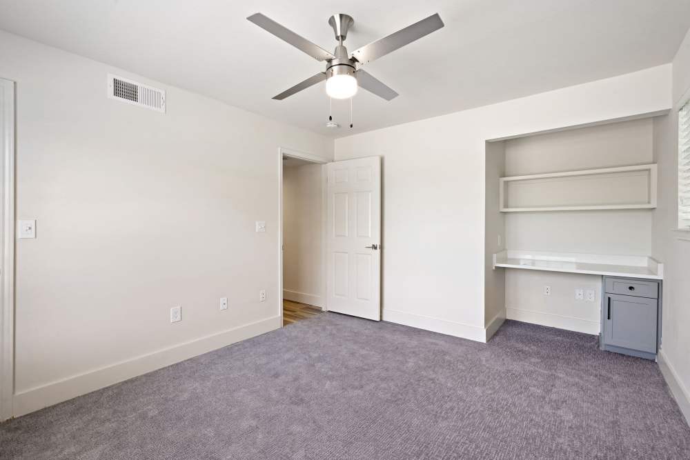 Well-lit bedroom with a working space at Seacrest in Katy, Texas